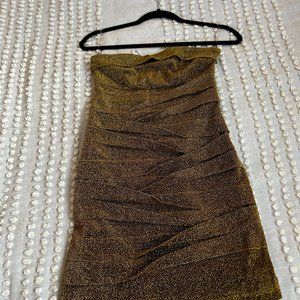 A Dynamite Sexy strapless glittery gold dress